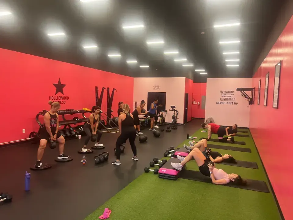 A women's group class in session at Holliewood Fitness