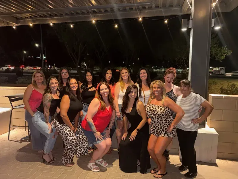 Holliewood Fitness members gathered together for a group photo at a community night out